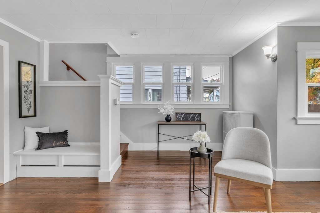34 Brunswick Street Springfield, MA 01108 - Photo 9 of 31 a living room with furniture and a large window
