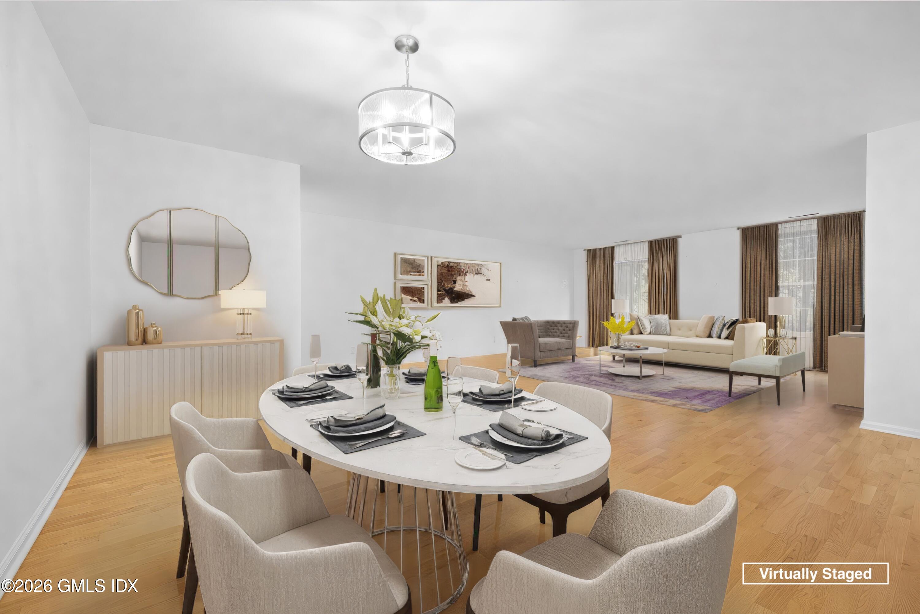 140 Field Point Road, Unit 2 Greenwich, CT 06830 - Photo 11 of 36 a view of a dining room with furniture