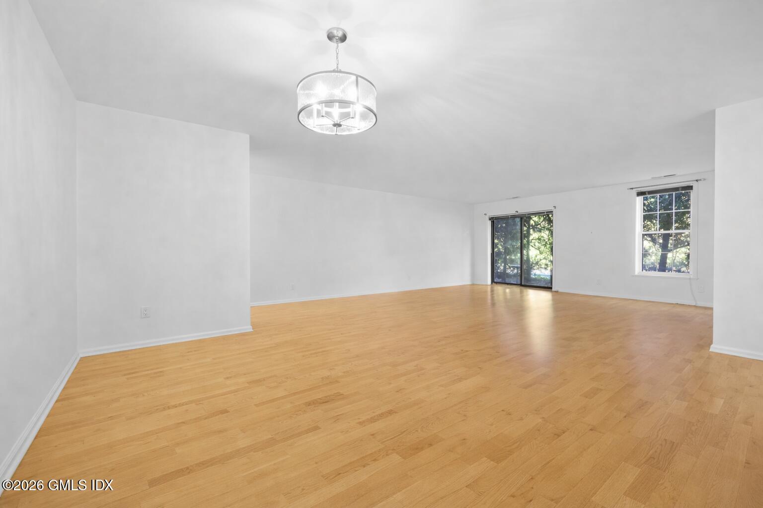 140 Field Point Road, Unit 2 Greenwich, CT 06830 - Photo 12 of 36 a view of empty room with window