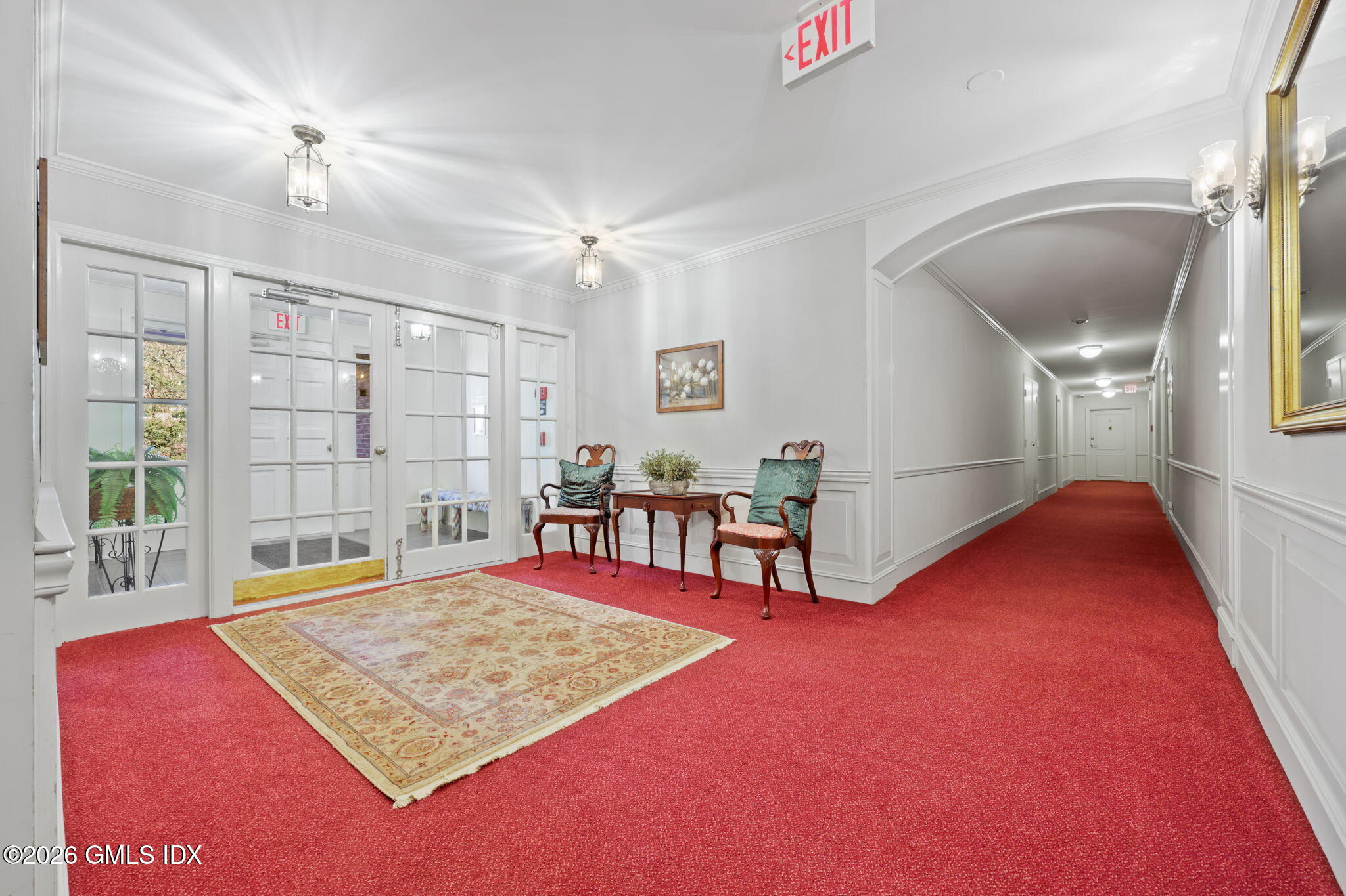 140 Field Point Road, Unit 2 Greenwich, CT 06830 - Photo 6 of 36 a living room with furniture pool table and a rug