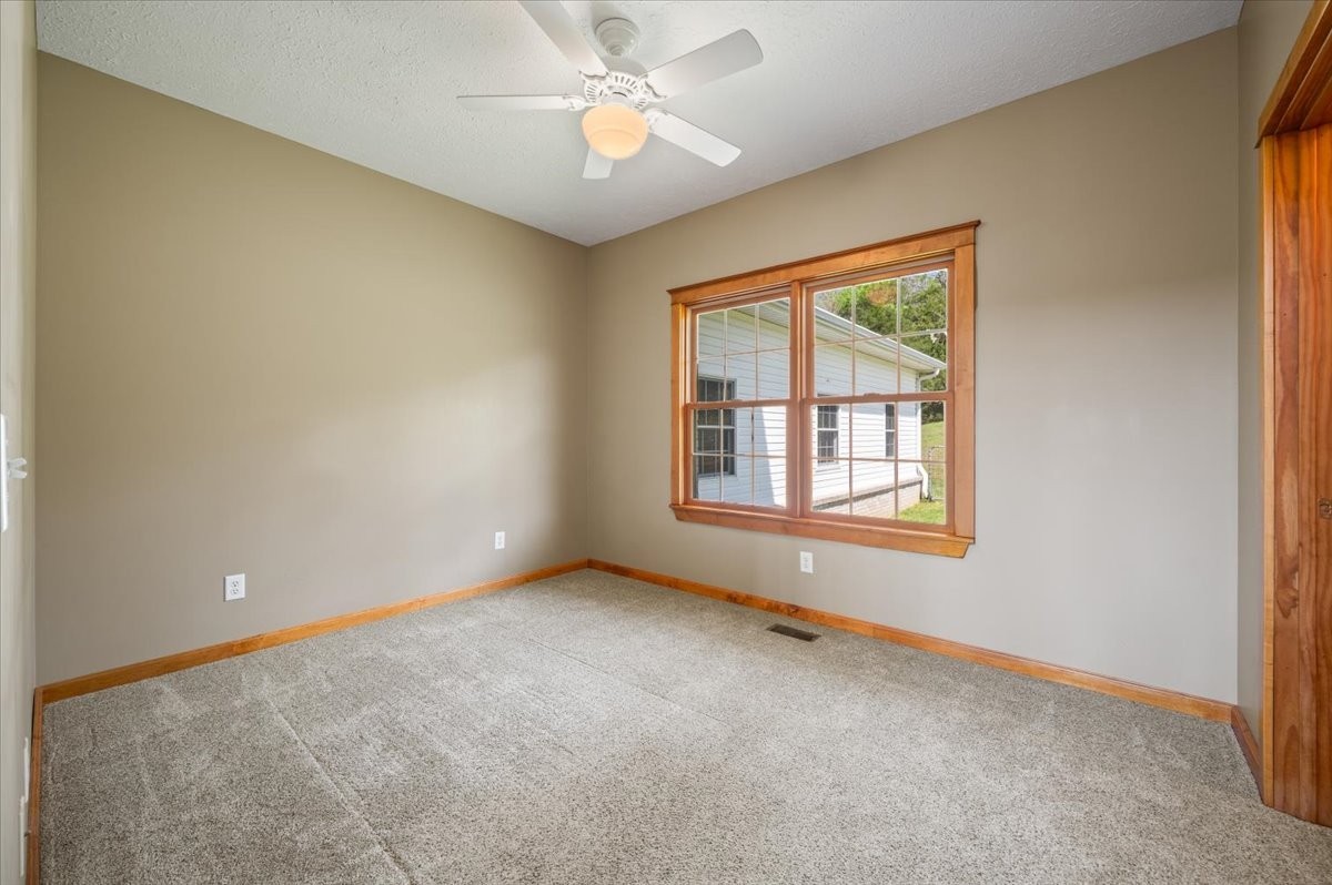 216 Old Wolf Hill Road Bethpage, TN 37022 - Photo 26 of 70 a view of an empty room with a window