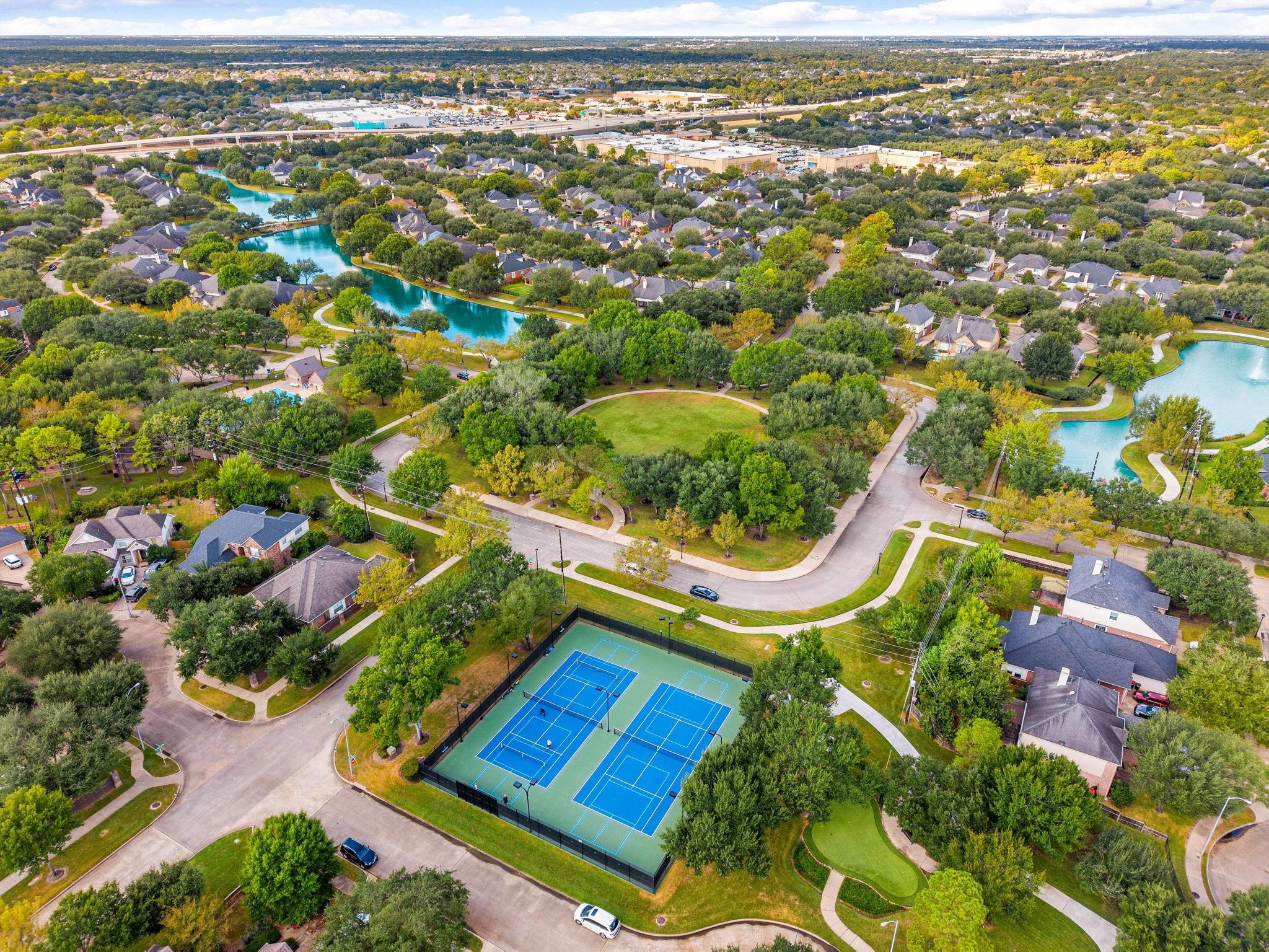 5718 Brennan Ridge Lane Katy, TX 77450 - Photo 36 of 42 ACTIVE COMMUNITY AMENITIES: Tennis and pickleball courts, open green spaces, and miles of walking and biking trails encourage an active lifestyle for all ages.