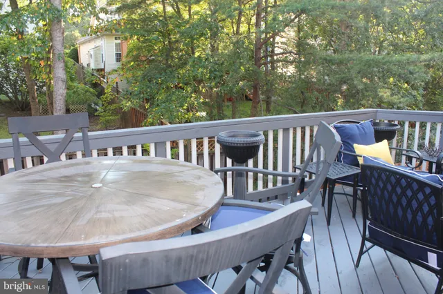 a view of balcony with wooden floor