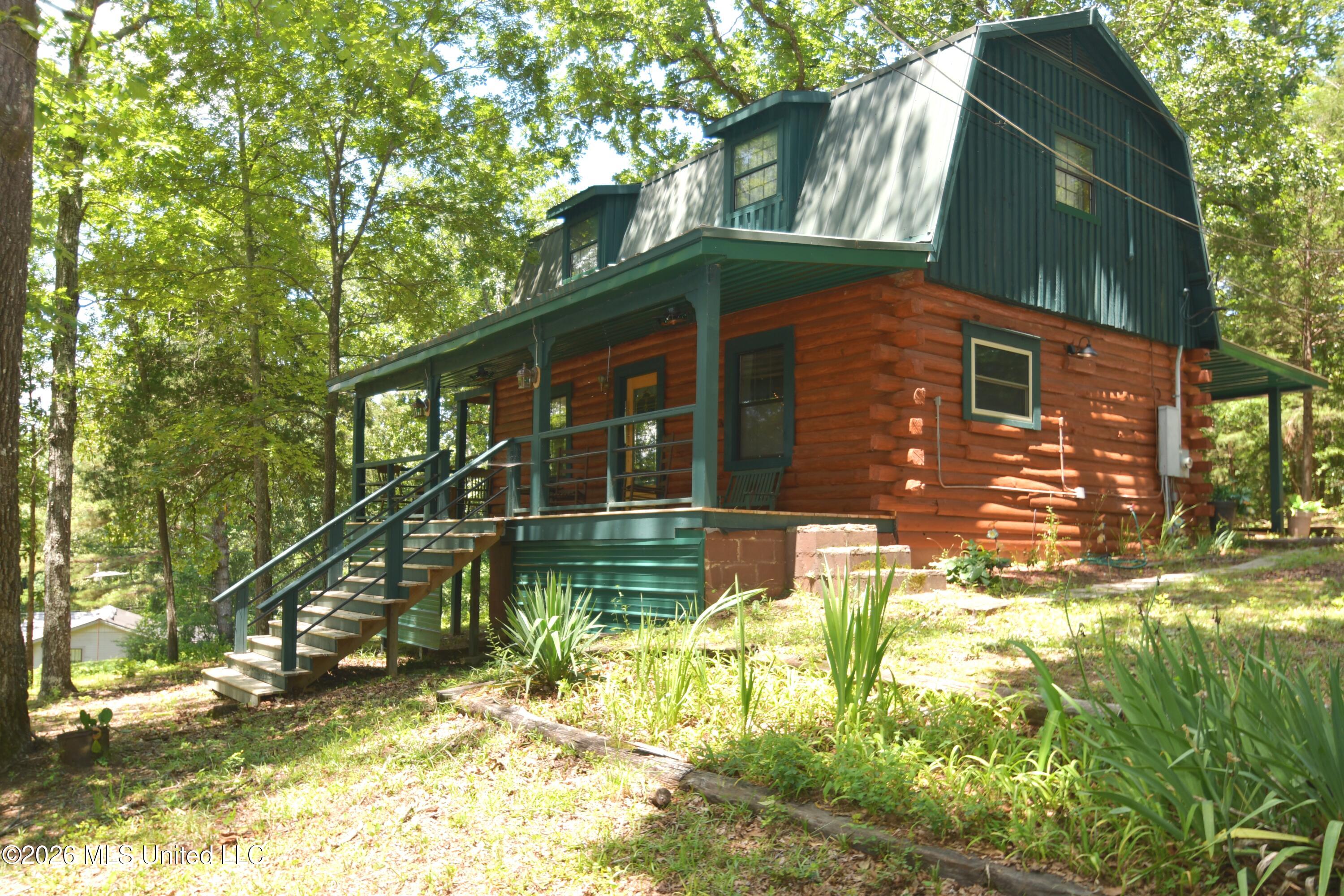 180 Red Oak Road Ashland, MS 38603 - Photo 3 of 33 Log Cabin