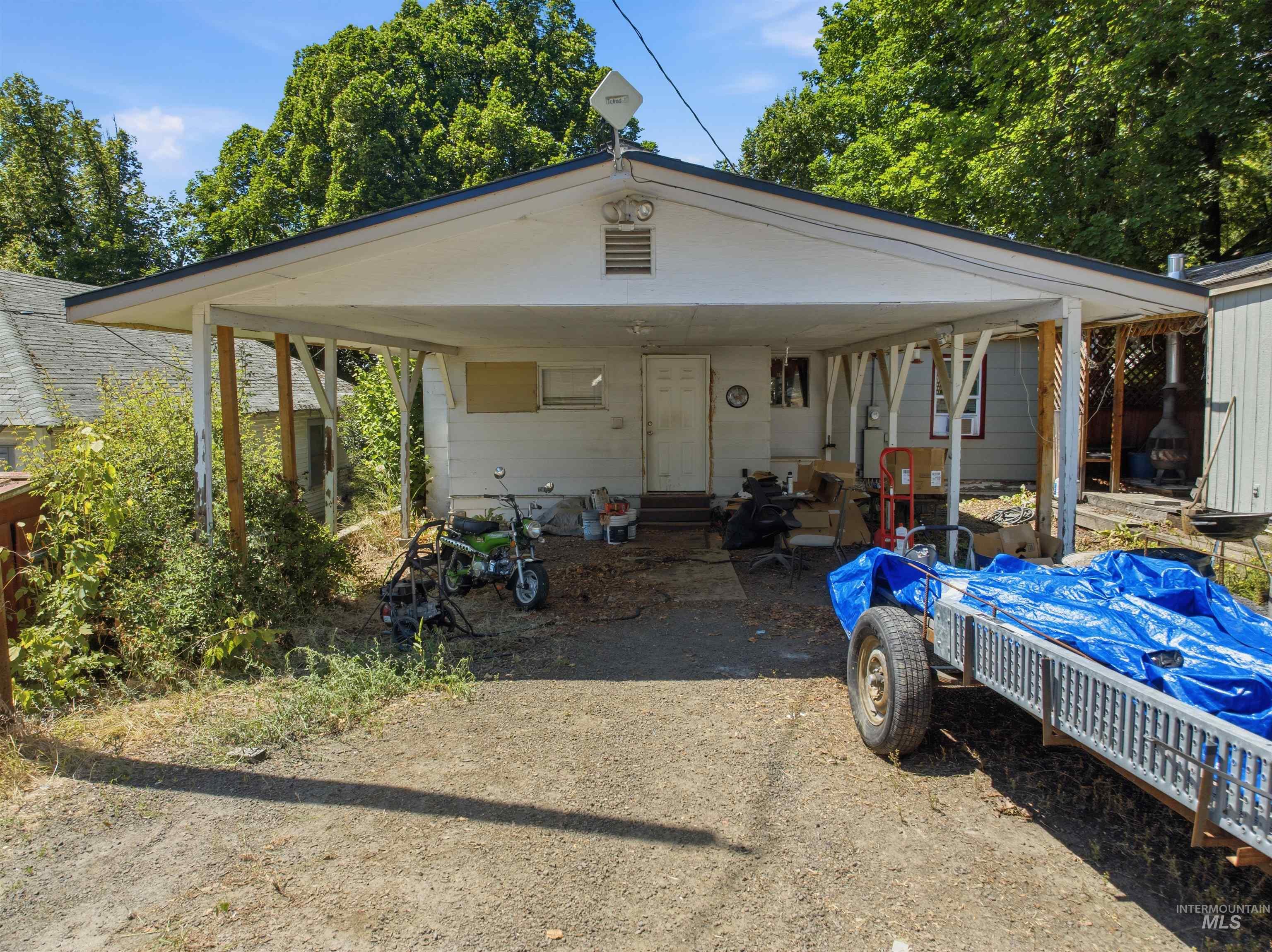 735 Oak Street Potlatch, ID 83855 - Photo 3 of 30 Carport structure offering covered outdoor space
