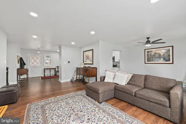 a living room with furniture and a couch