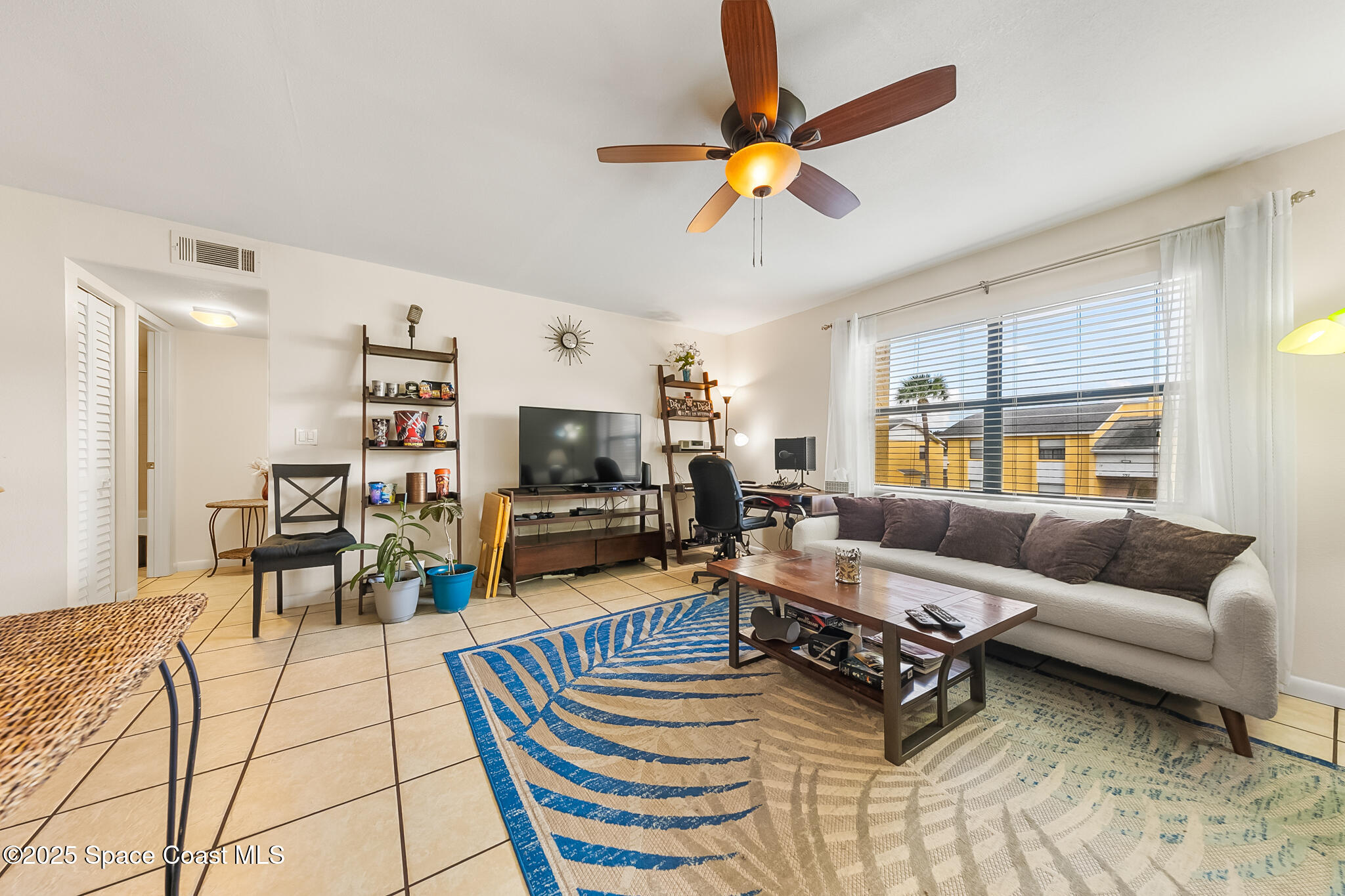 598 North Wickham Road, Unit 32 Melbourne, FL 32935 - Photo 3 of 21 Living Room