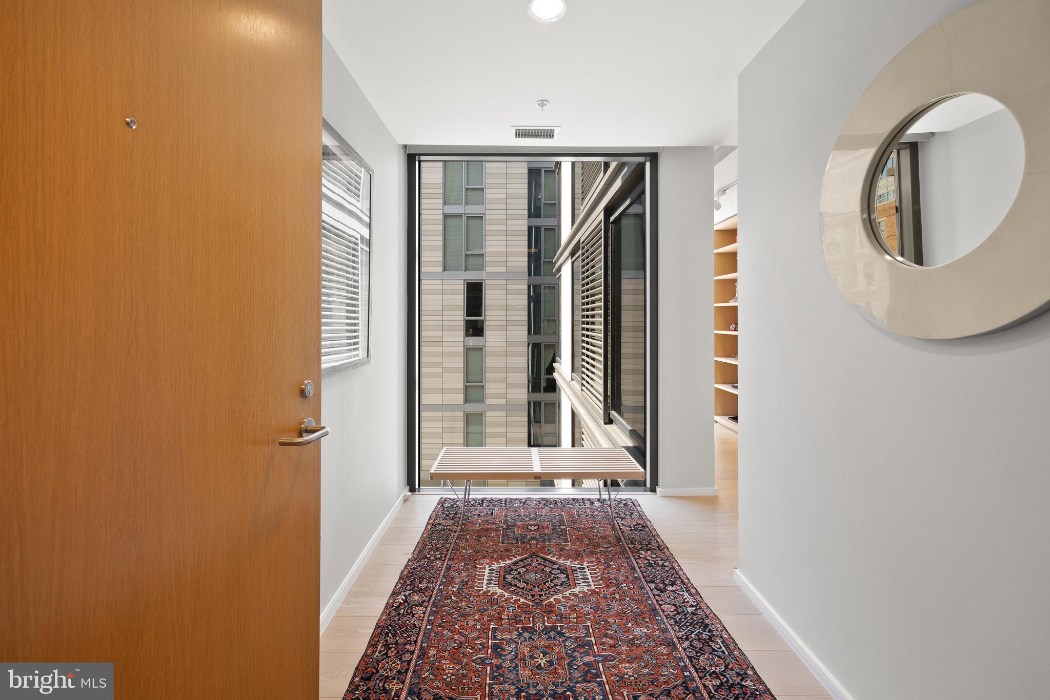 925 H Street Northwest, Unit 501 Washington, DC 20001 - Photo 3 of 32 A Floor to Ceiling Window Upon Entry