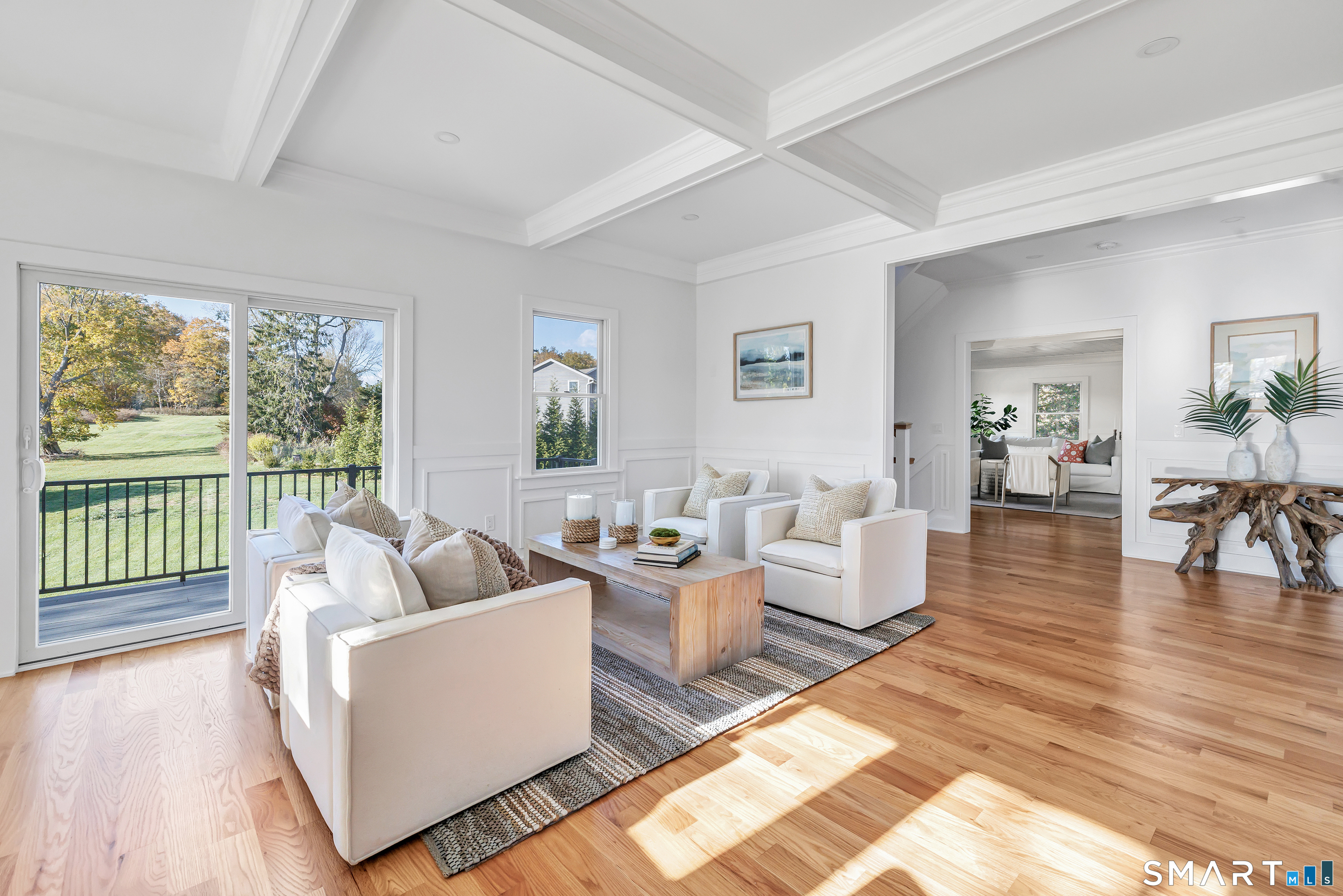 212 Milford Point Road Milford, CT 06460 - Photo 37 of 40 a living room with furniture and a large window