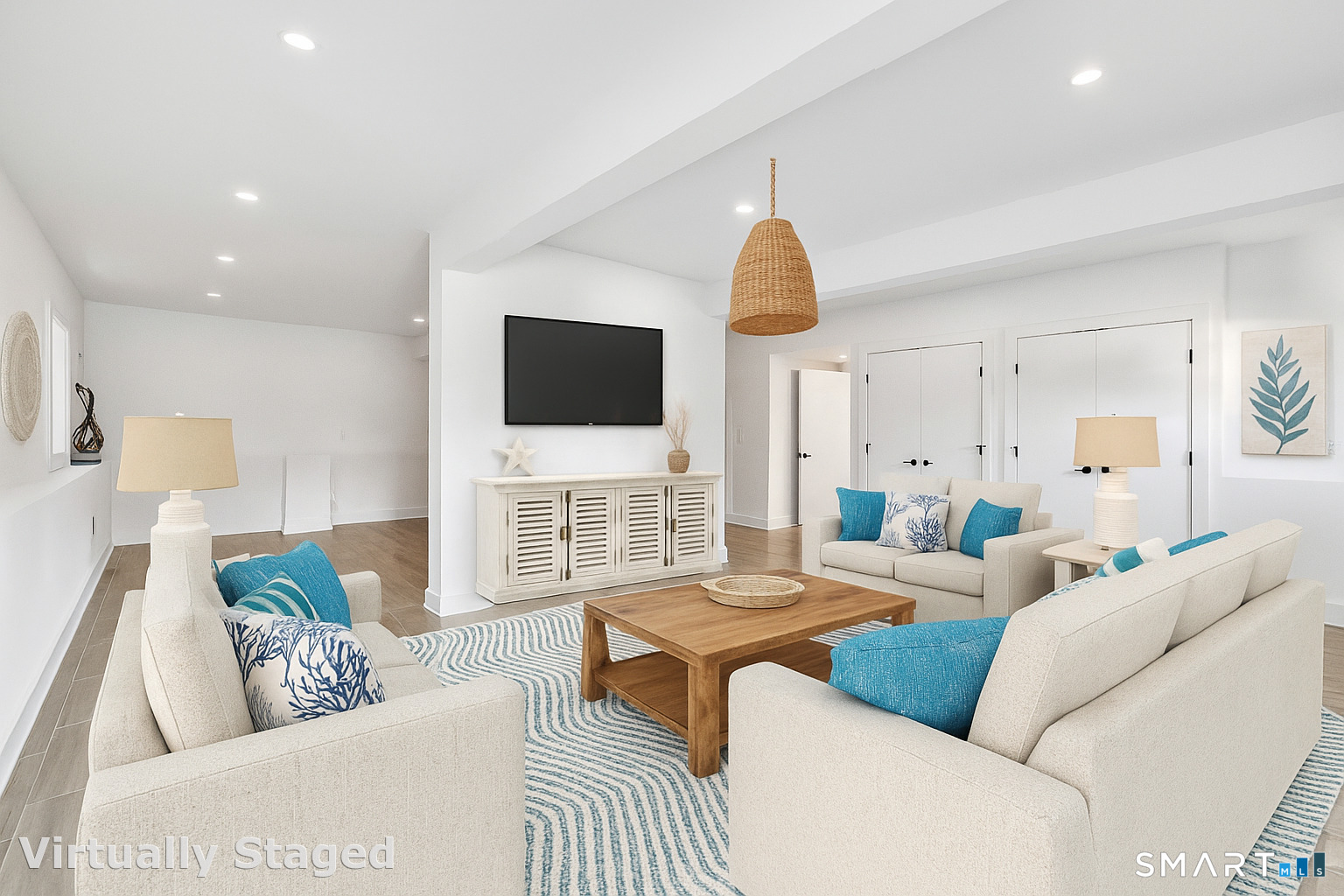 212 Milford Point Road Milford, CT 06460 - Photo 39 of 40 a living room with furniture and a flat screen tv