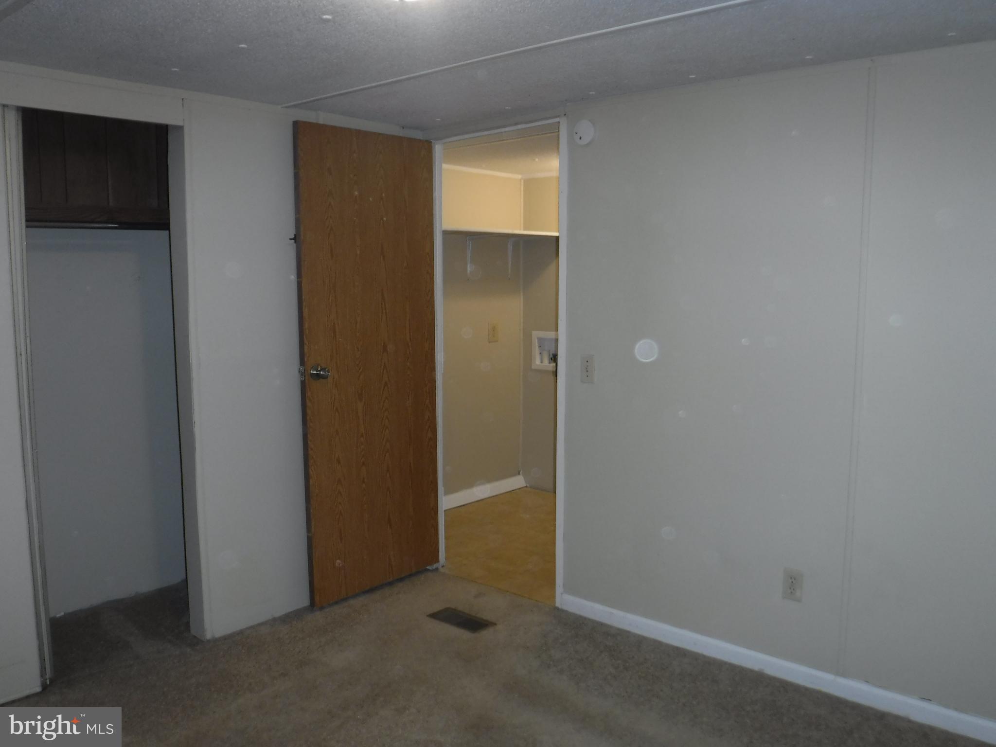 47 Shamrock Avenue Dover, DE 19901 - Photo 11 of 13 an empty room with closet area