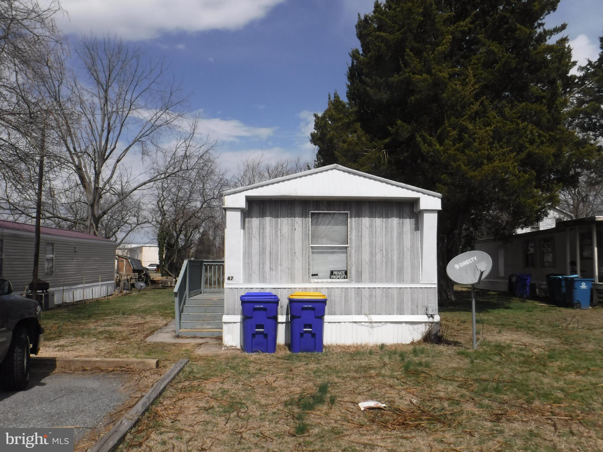 47 Shamrock Avenue Dover, DE 19901 - Photo 13 of 13 a front view of a house with a yard