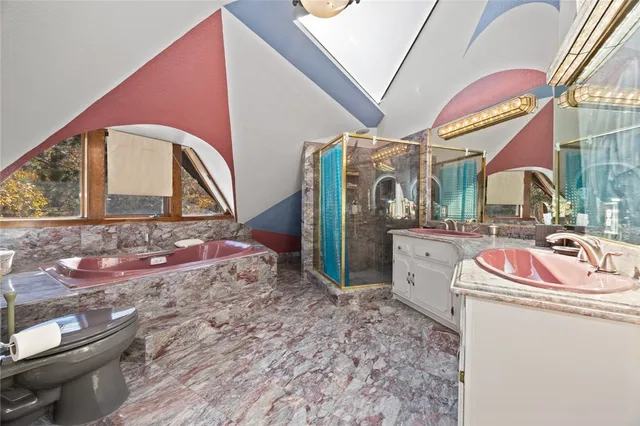 a bathroom with a sink a vanity and mirror