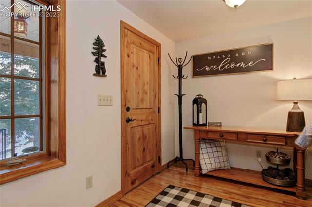 5790 Ona Road Cascade, CO 80809 - Photo 3 of 32 Entry off front porch