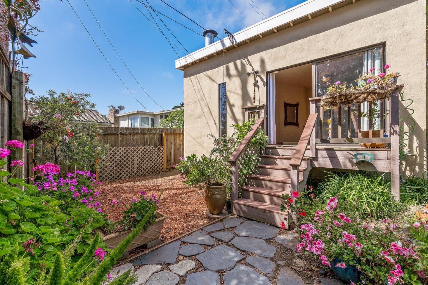 120 La Prenda Millbrae, CA 94030 - Photo 37 of 43 a view of a house with potted plants