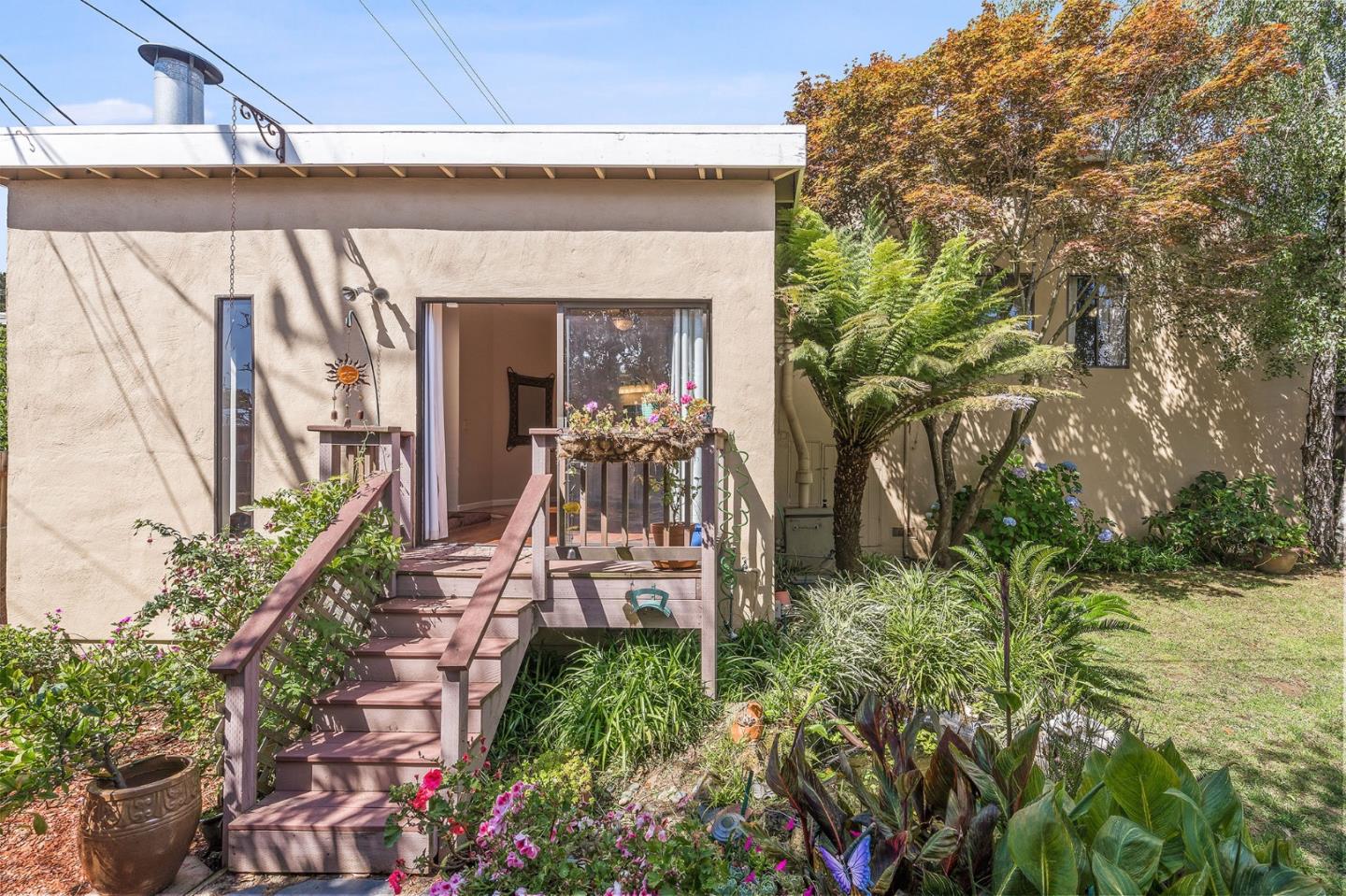 120 La Prenda Millbrae, CA 94030 - Photo 40 of 43 a view of a house with a flower garden