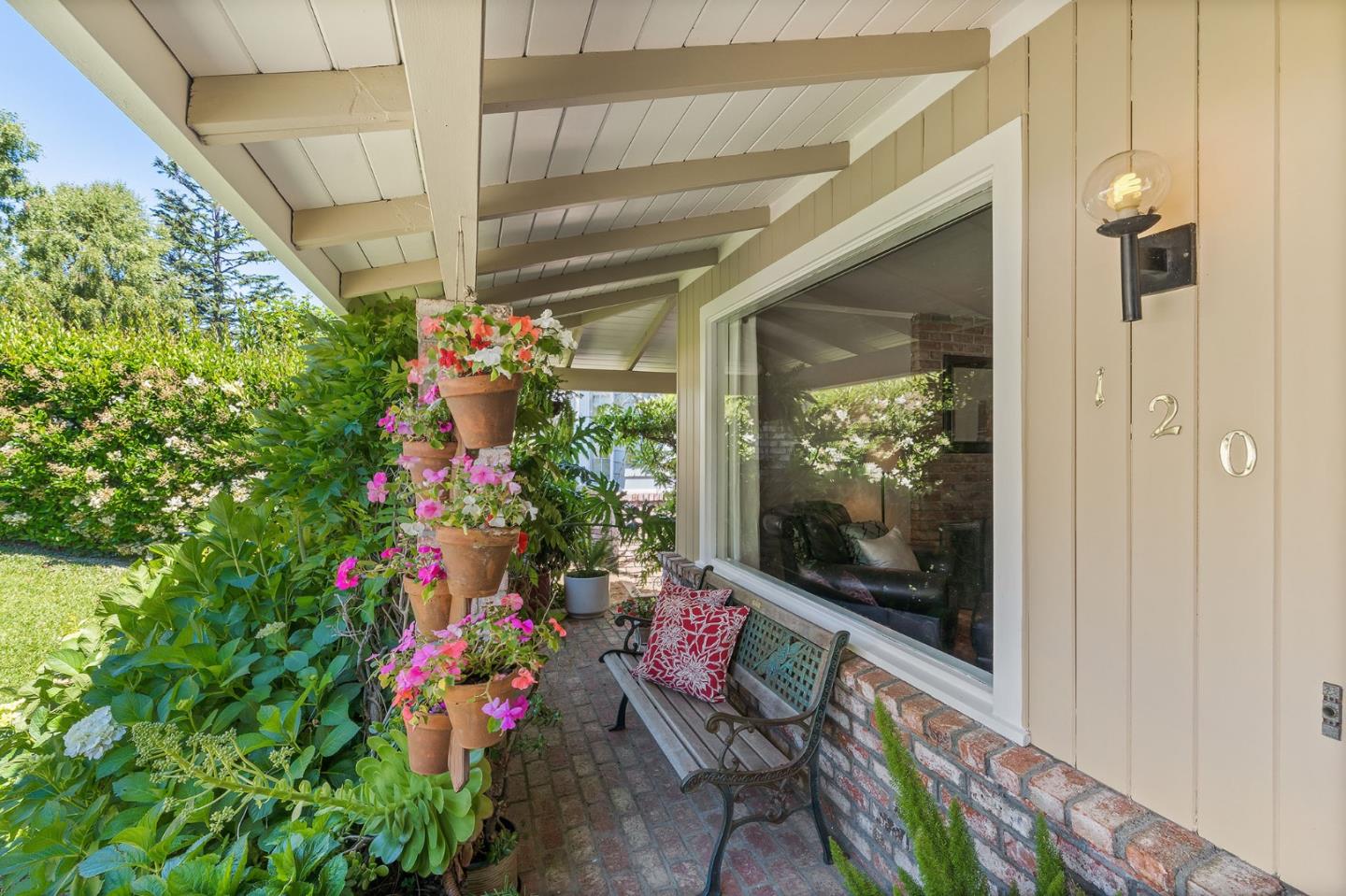 120 La Prenda Millbrae, CA 94030 - Photo 4 of 43 a view of a porch with a flower garden