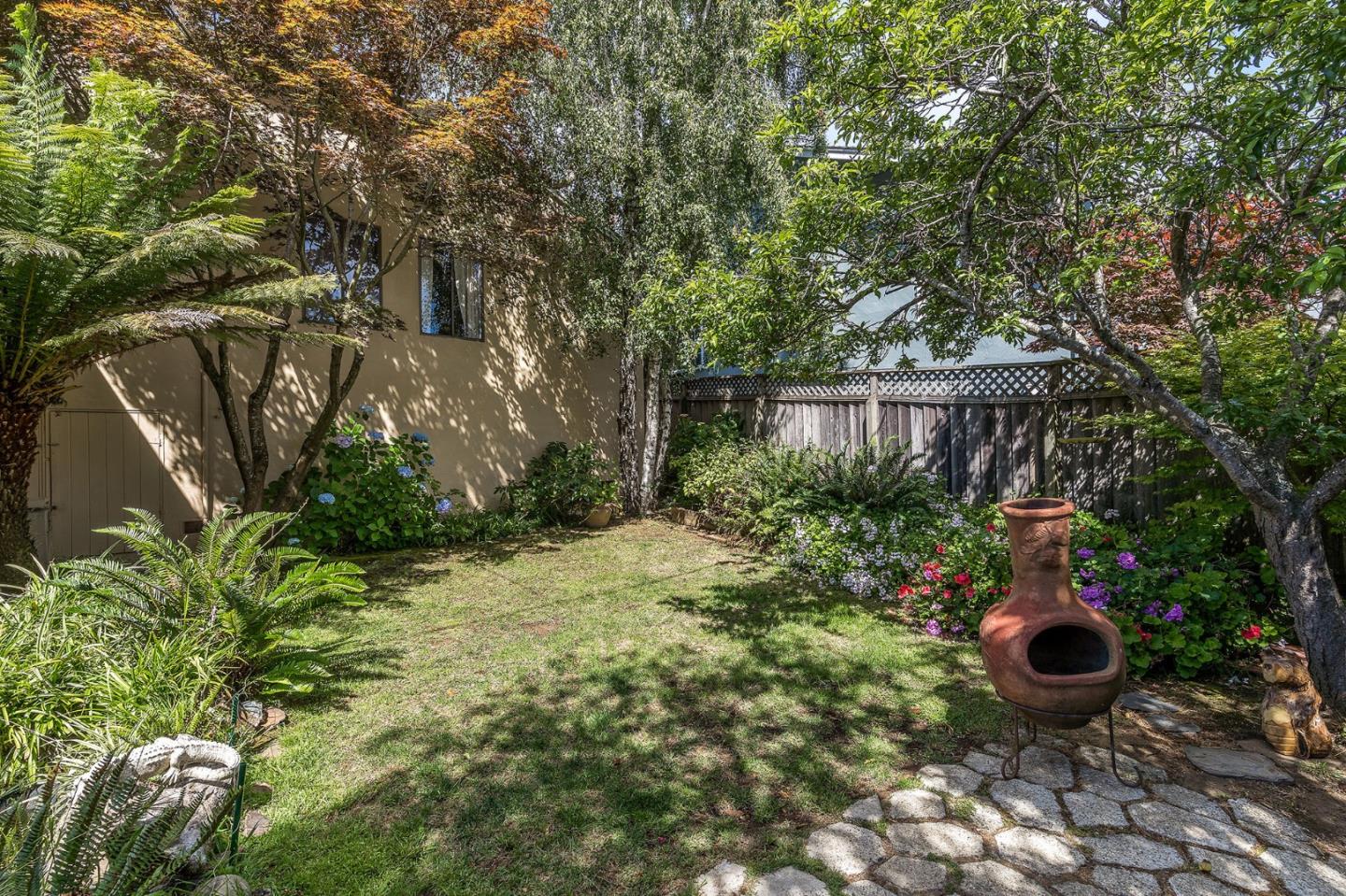 120 La Prenda Millbrae, CA 94030 - Photo 41 of 43 a view of a backyard with plants and patio