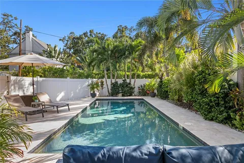 a view of a swimming pool with a patio