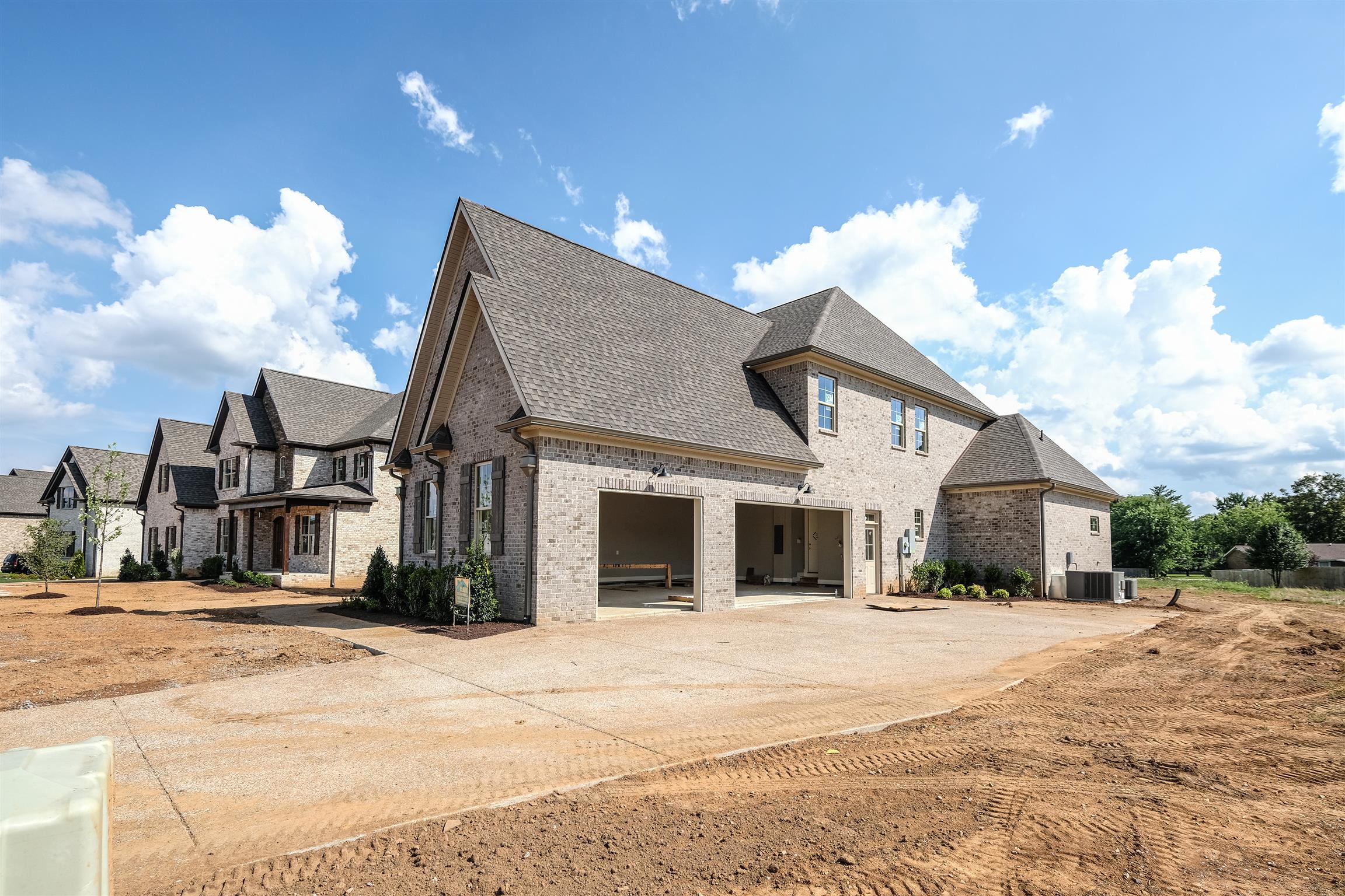 2039 Autumn Ridge Way Spring Hill, TN 37174 - Photo 2 of 30 Home has 3-car side entry garage with ample parking.