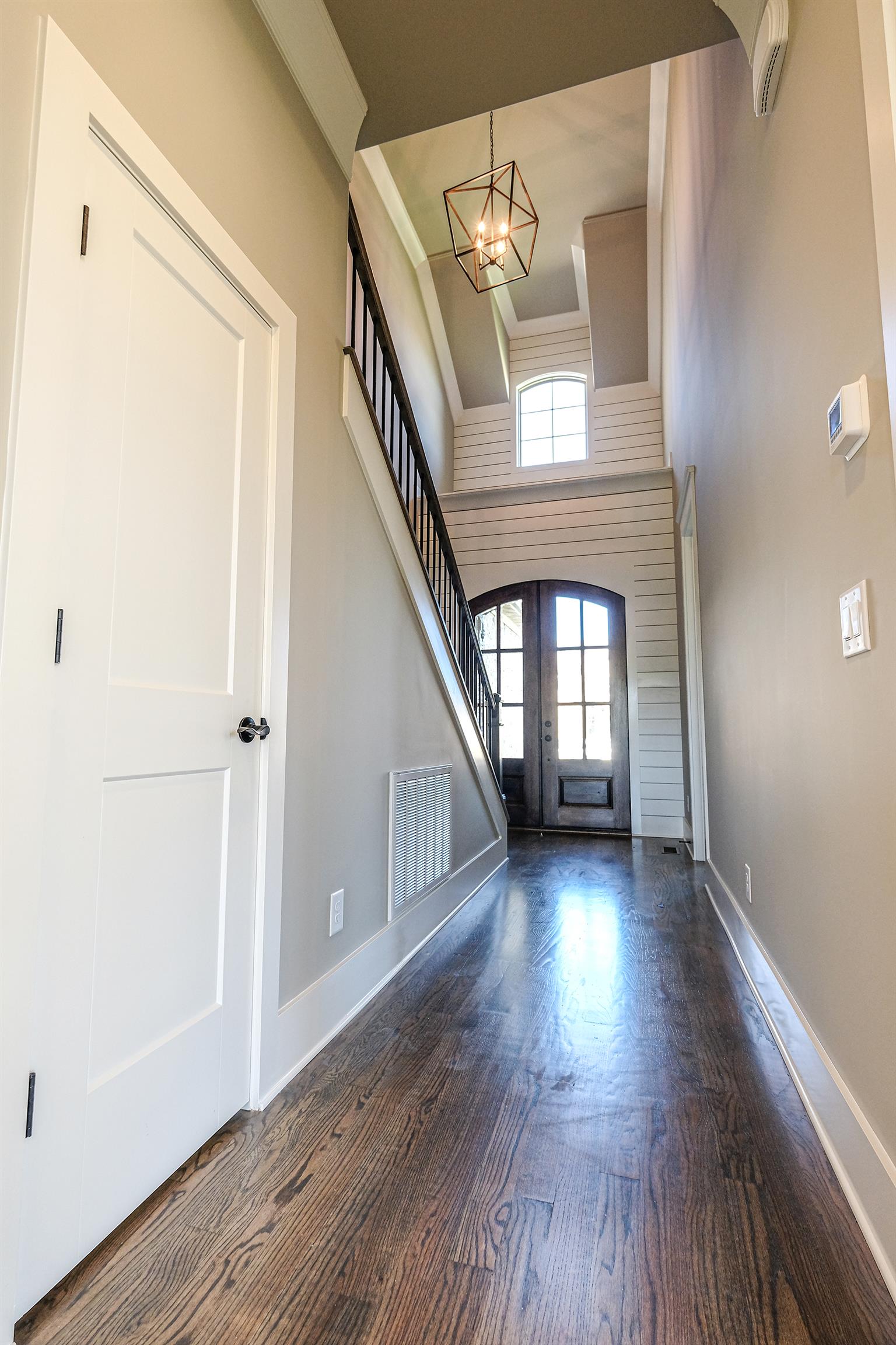 2039 Autumn Ridge Way Spring Hill, TN 37174 - Photo 3 of 30 Impressive 2-story entry with shiplap accents.