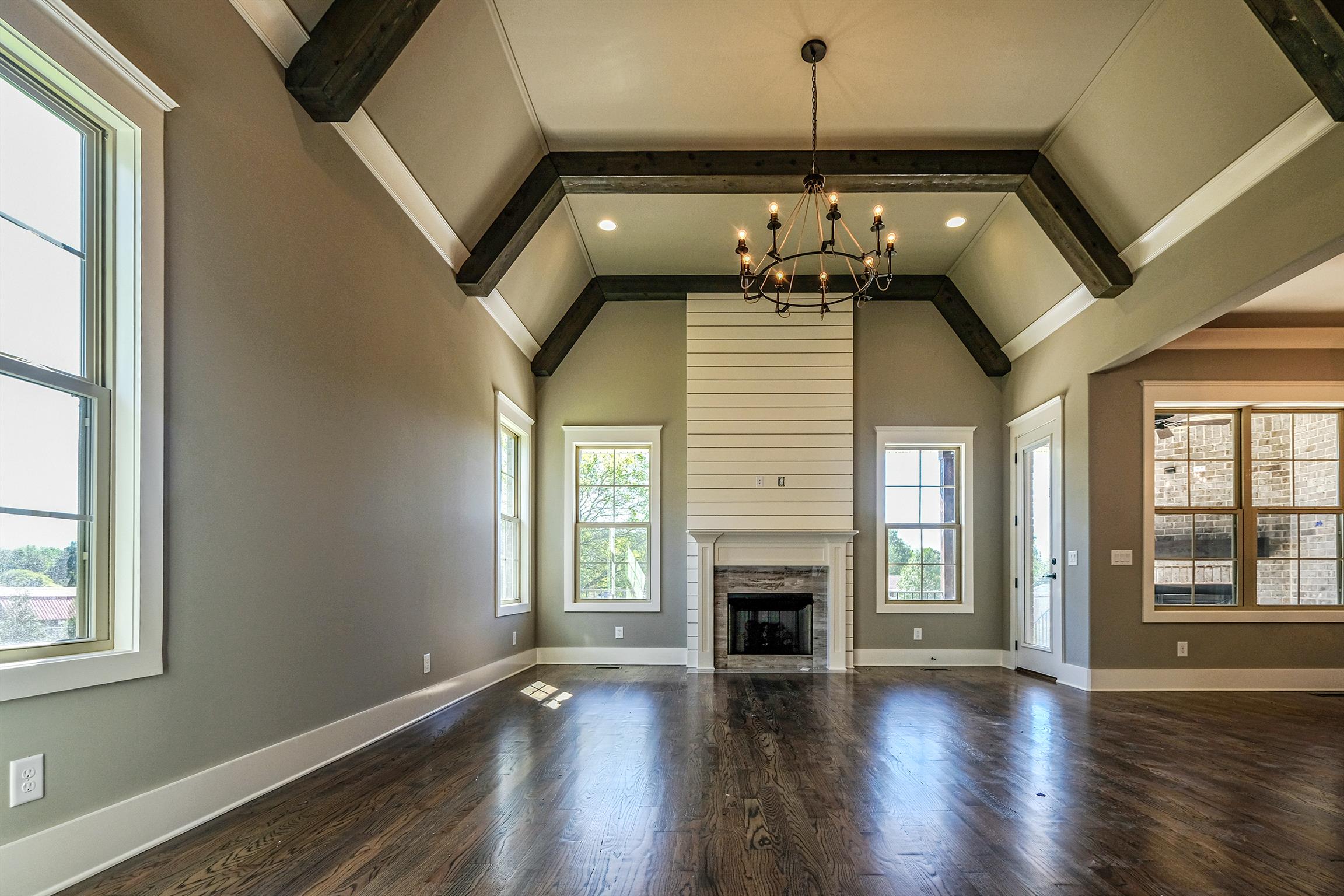 2039 Autumn Ridge Way Spring Hill, TN 37174 - Photo 5 of 30 Dramatic vaulted great room with cedar wrapped beams.