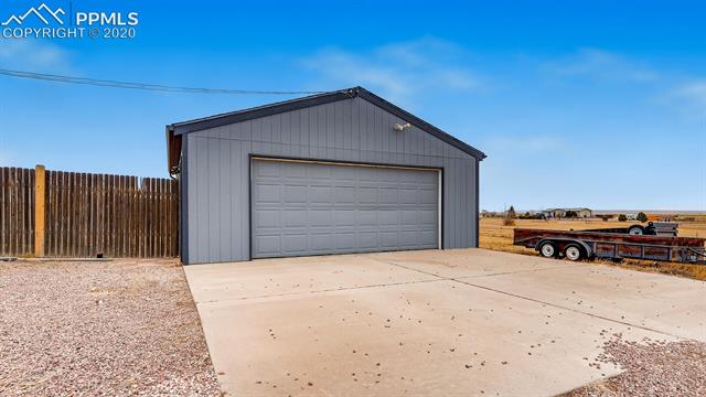 17570 Sage Crest Road Peyton, CO 80831 - Photo 3 of 25 Spacious 2 car detached garage