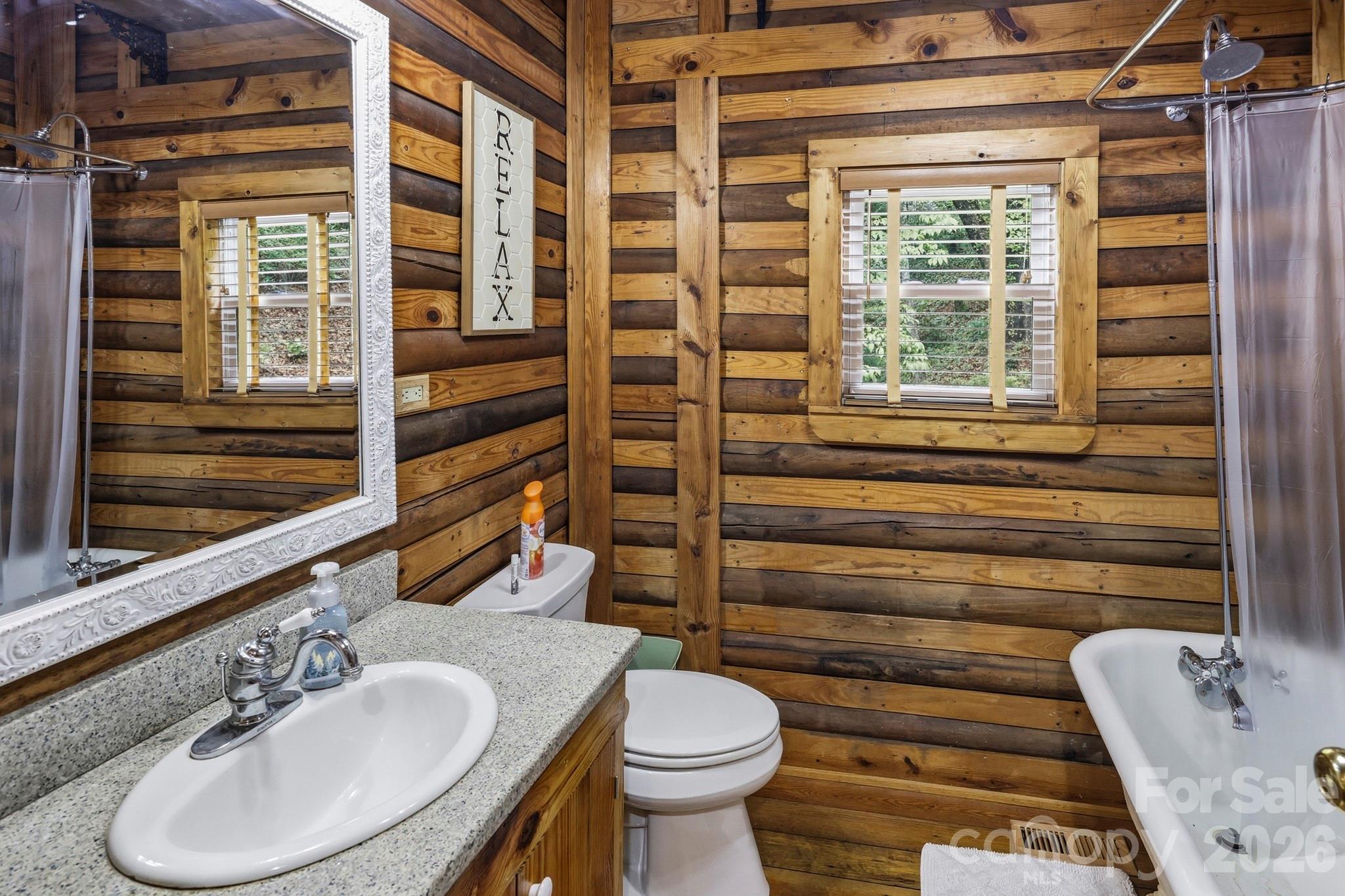 118 Rock Pt Road Lake Lure, NC 28746 - Photo 21 of 31 a bathroom with a sink toilet and shower