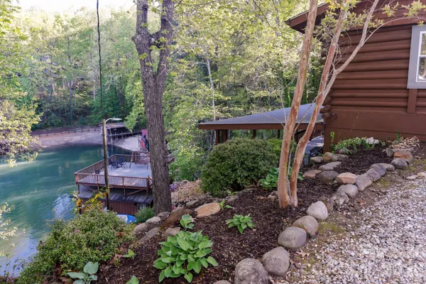a view of a chairs with a backyard