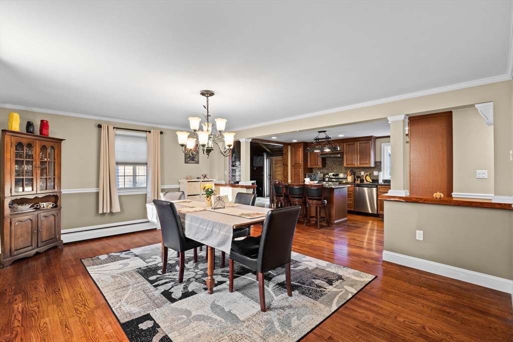 5 Staffon Road Fairhaven, MA 02719 - Photo 12 of 41 a view of a dining room with furniture and wooden floor