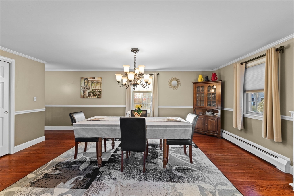 5 Staffon Road Fairhaven, MA 02719 - Photo 13 of 41 a view of a dining room with furniture window and wooden floor