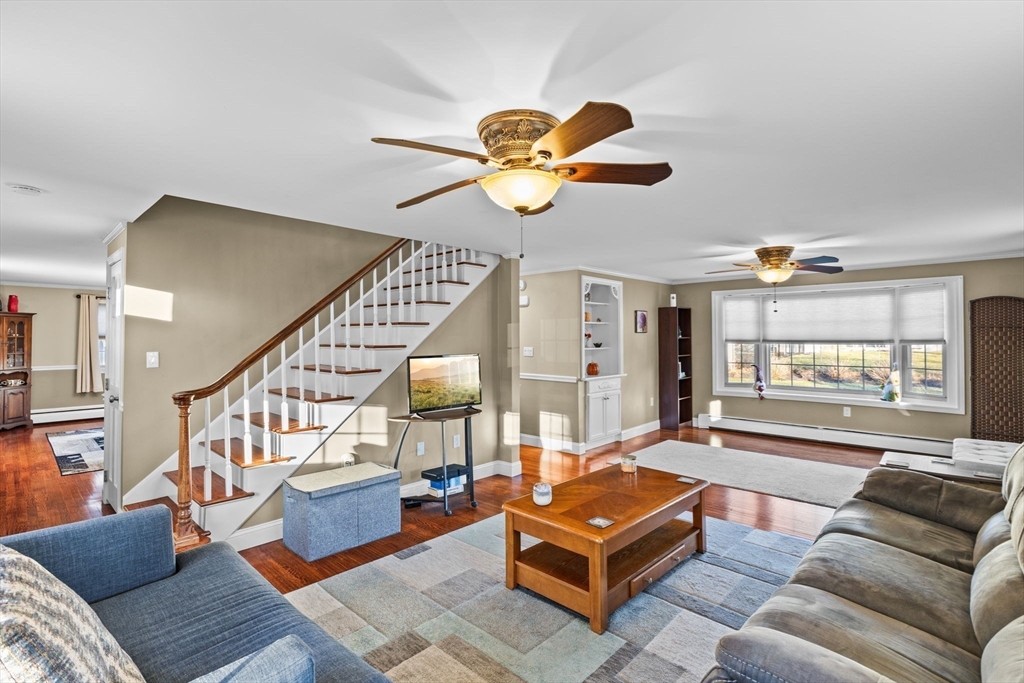 5 Staffon Road Fairhaven, MA 02719 - Photo 19 of 41 a living room with furniture ceiling fan and a rug