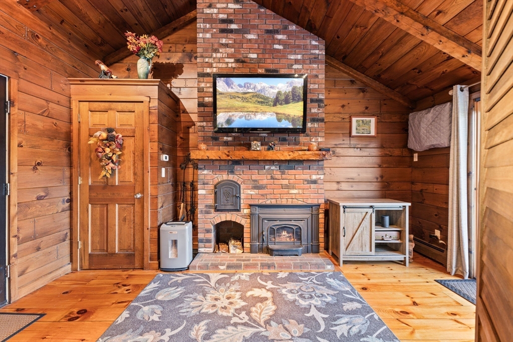5 Staffon Road Fairhaven, MA 02719 - Photo 4 of 41 a view of a livingroom with a fireplace