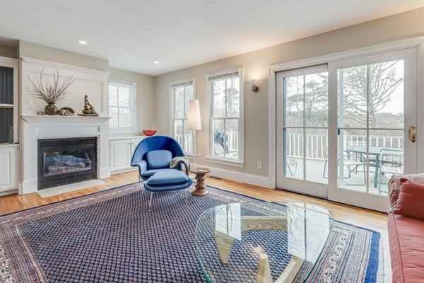 7 Cod Lane, Unit 7 Harwich, MA 02646 - Photo 11 of 41 a living room with furniture and a fireplace