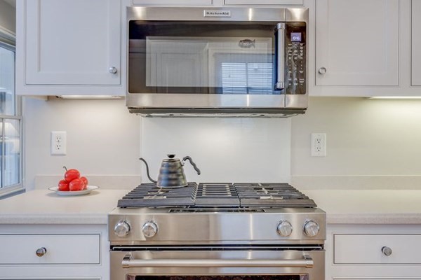 7 Cod Lane, Unit 7 Harwich, MA 02646 - Photo 20 of 41 a stove top oven sitting inside of a kitchen