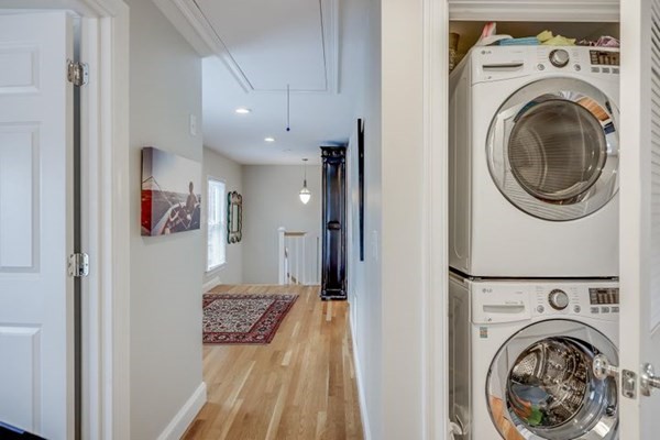 7 Cod Lane, Unit 7 Harwich, MA 02646 - Photo 35 of 41 a view of a hallway with washer and dryer