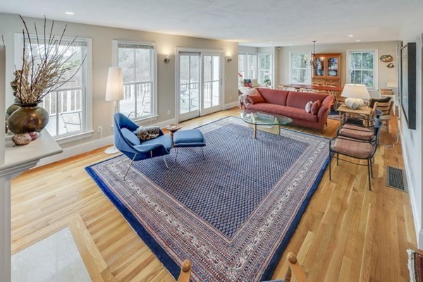 7 Cod Lane, Unit 7 Harwich, MA 02646 - Photo 10 of 41 a living room with furniture rug and wooden floor