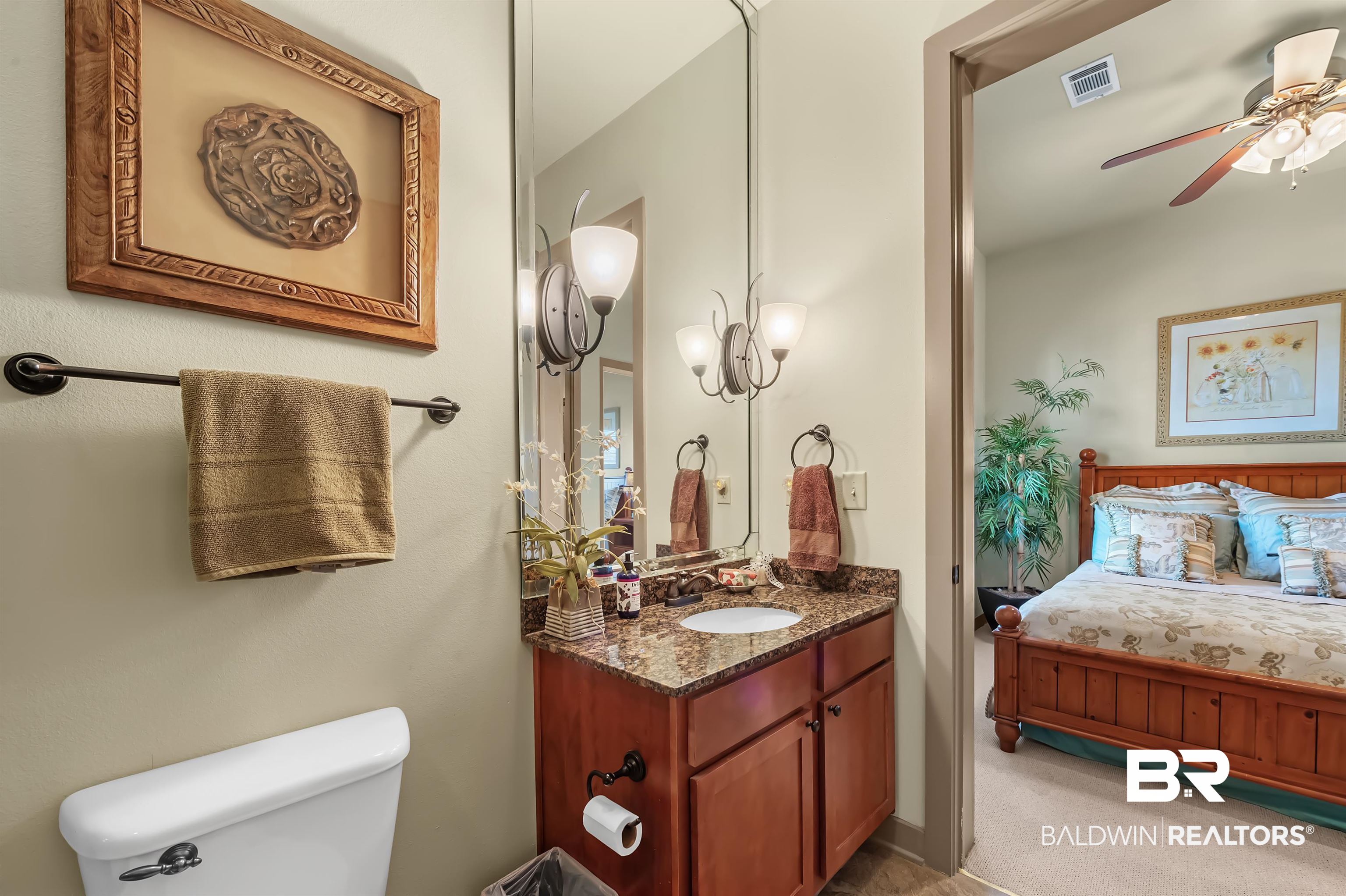 1430 Regency Road, Unit A301 Gulf Shores, AL 36542 - Photo 31 of 47 Bathroom with vanity, toilet, and ceiling fan