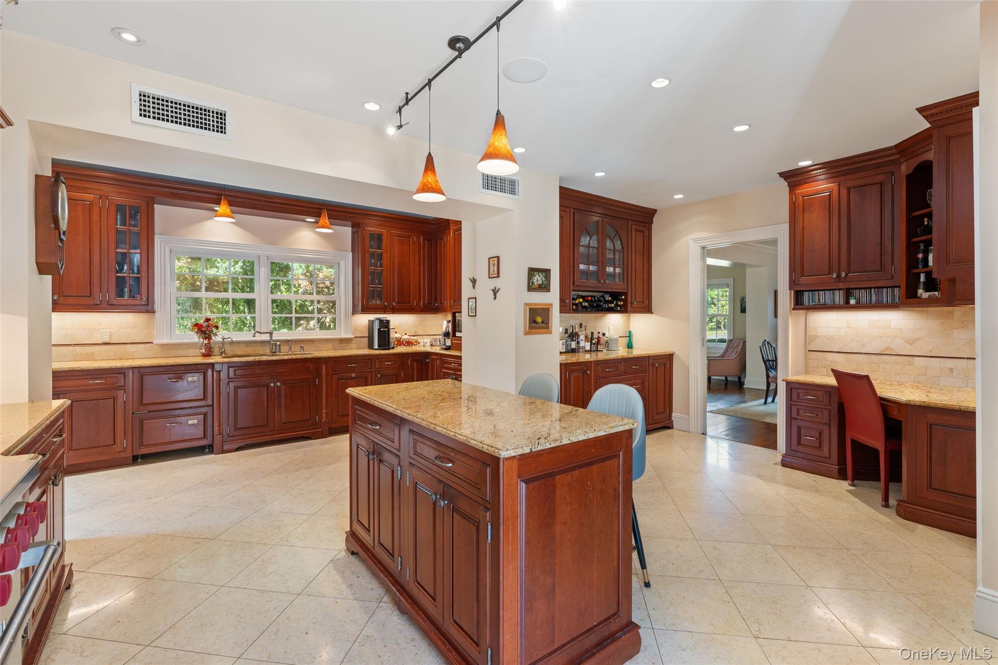 5 Cooper Road Scarsdale, NY 10583 - Photo 8 of 46 Gourmet kitchen with custom cabinetry with center island