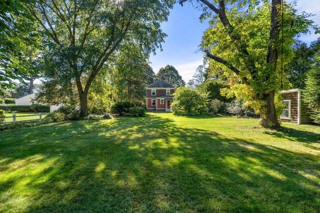 365 Weston Road Wellesley, MA 02481 - Photo 21 of 28 a view of a house with a yard