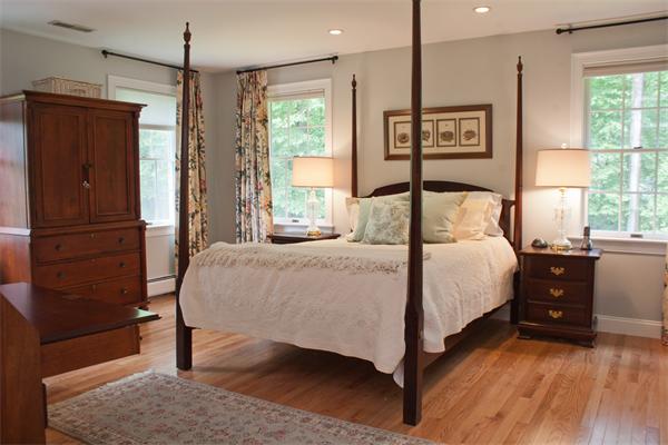 110 Kimball Road Carlisle, MA 01741 - Photo 15 of 25 a bedroom with a bed and a window