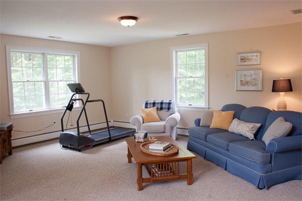 110 Kimball Road Carlisle, MA 01741 - Photo 20 of 25 a living room with furniture a window and a lamp