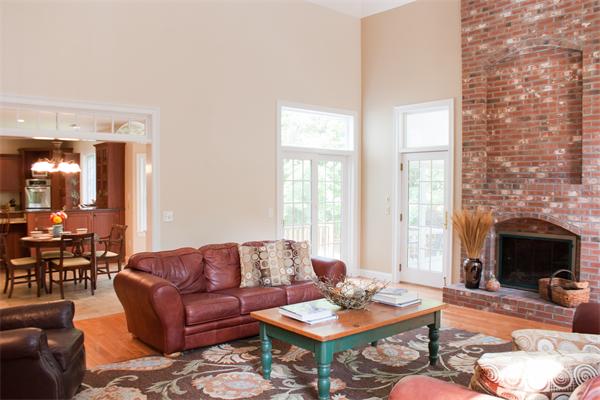 110 Kimball Road Carlisle, MA 01741 - Photo 4 of 25 a living room with furniture and a fireplace