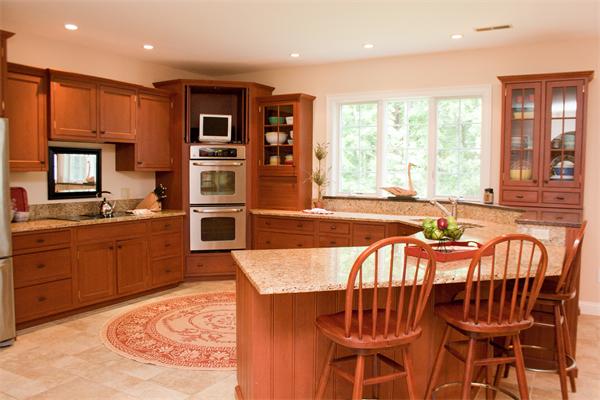 110 Kimball Road Carlisle, MA 01741 - Photo 7 of 25 a large kitchen with a table and chairs