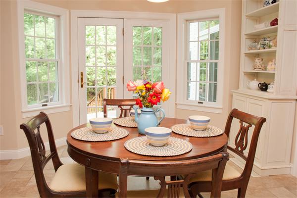 110 Kimball Road Carlisle, MA 01741 - Photo 8 of 25 a view of a dining room with furniture window and wooden floor
