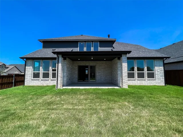 a view of a yard in front of a house
