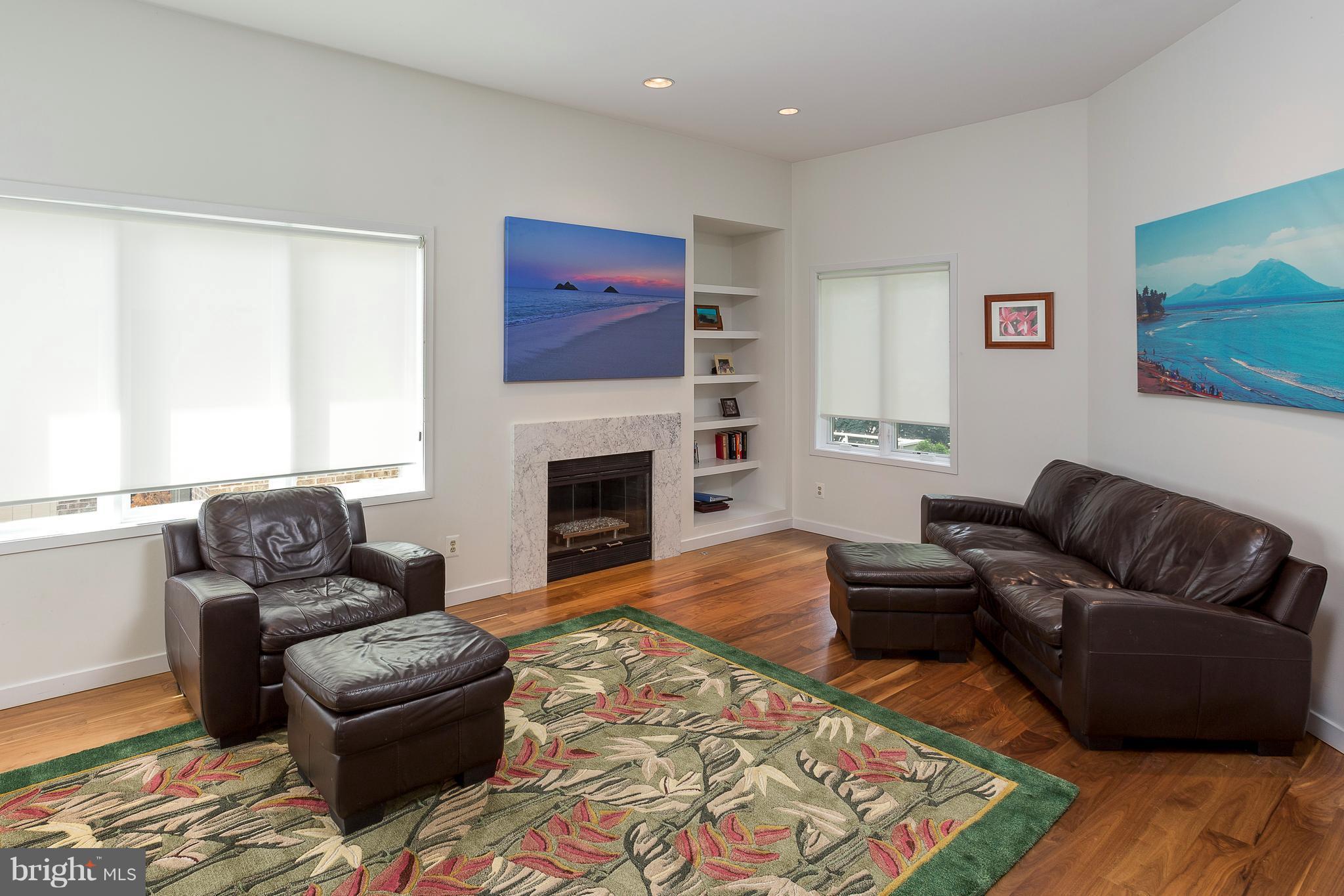 2038 Beacon Place Reston, VA 20191 - Photo 14 of 28 Built-ins and fireplace