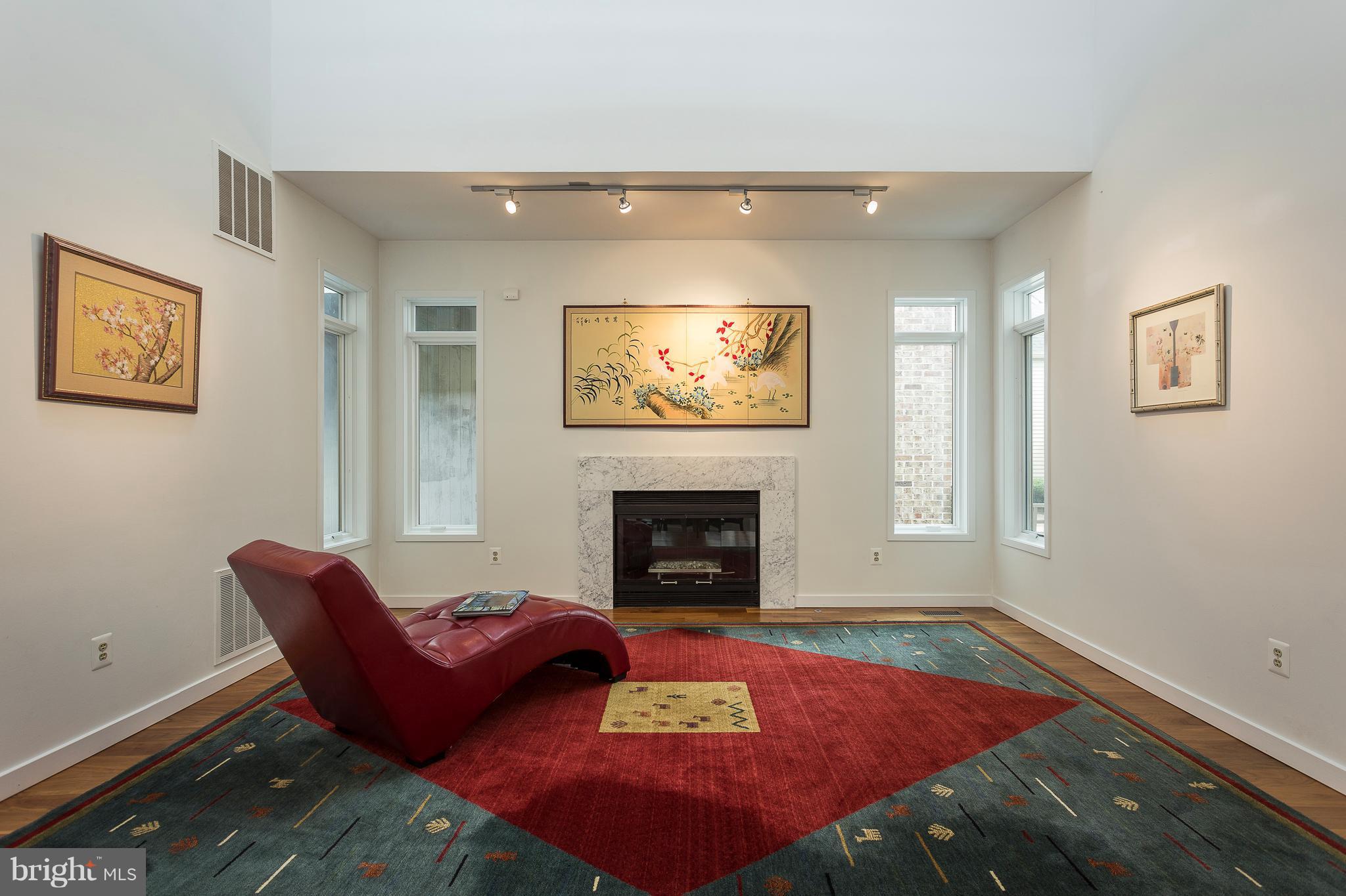 2038 Beacon Place Reston, VA 20191 - Photo 6 of 28 Two-story living room w/skylights