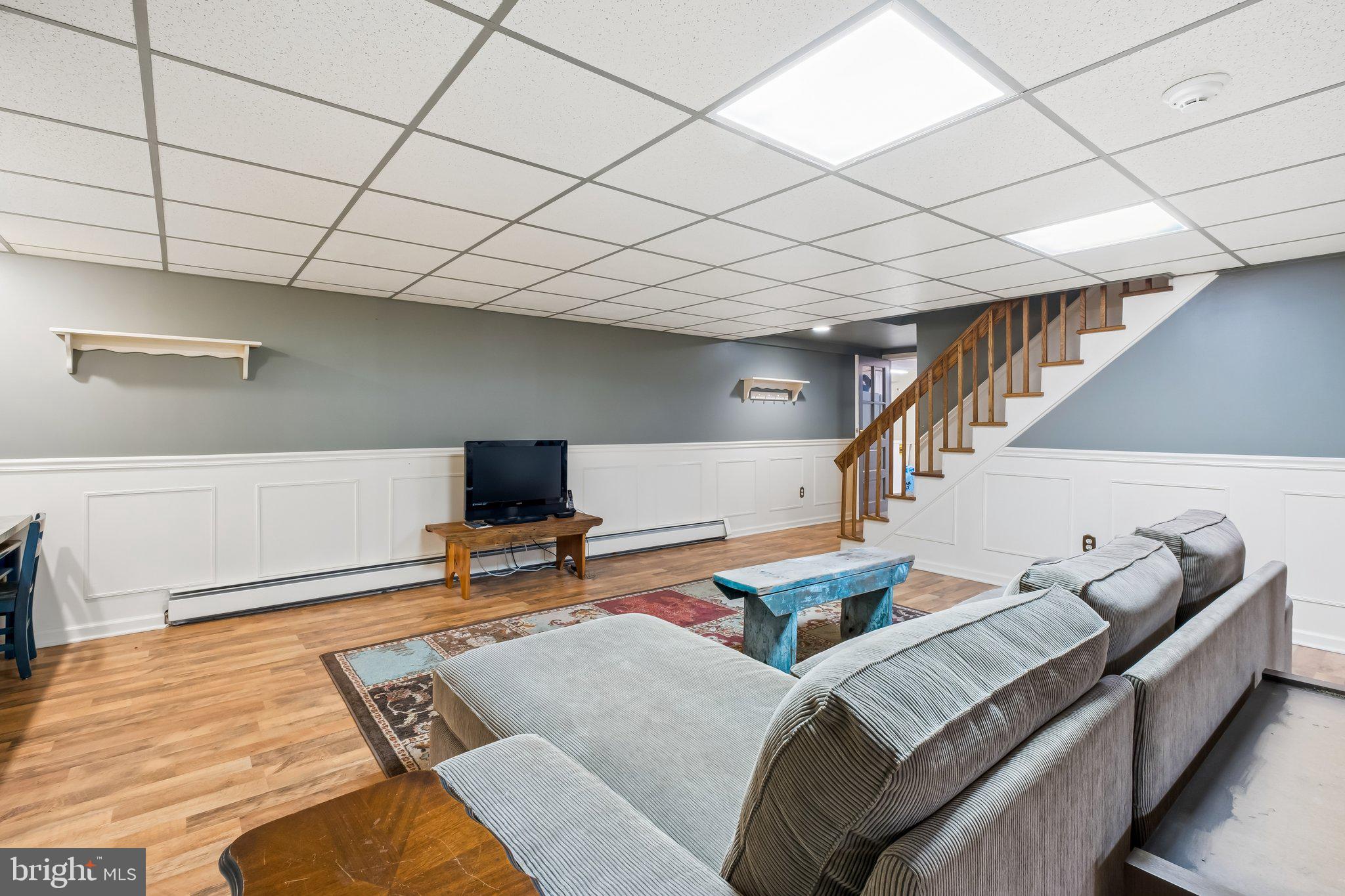 713 Alene Road Ambler, PA 19002 - Photo 32 of 40 a living room with furniture and wooden floor