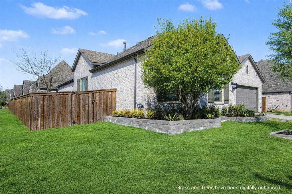 1101 Claiborne Drive Aubrey, TX 76227 - Photo 2 of 40 a view of a house with backyard and garden